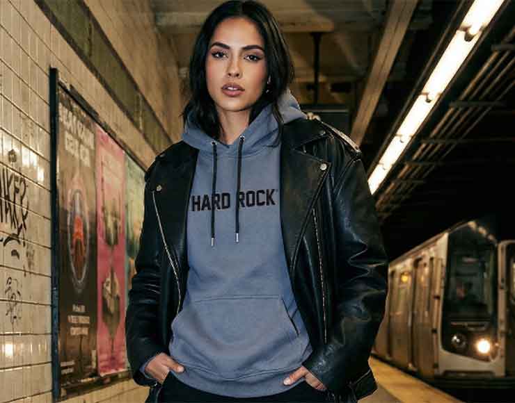 Women wearing Hard Rock Fleece in the subway. 