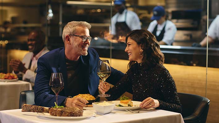 man and woman dining at a NYY Steak at Seminole Casino Coconut Creek
