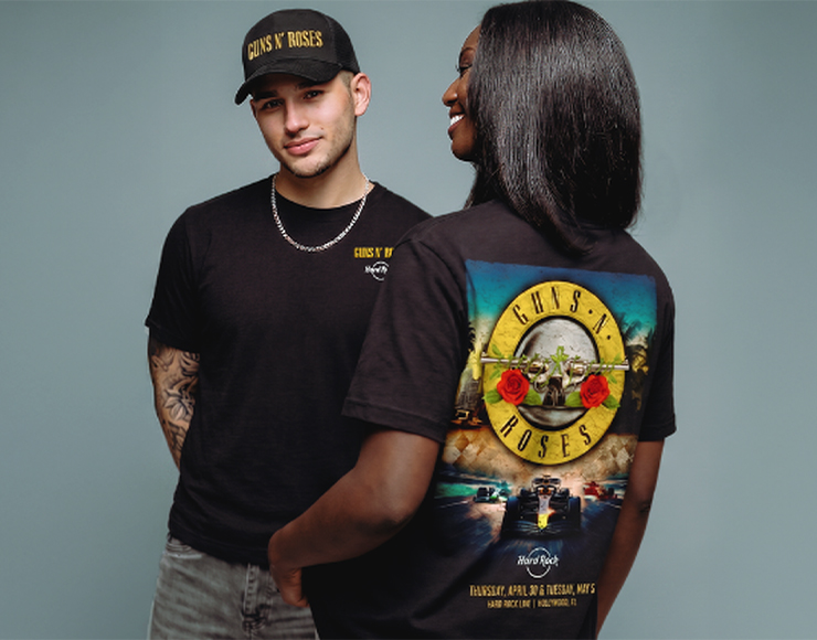 man and women wearing guns and roses tee