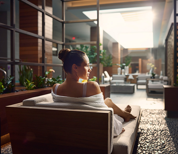 Woman on lounge chair at Rock Spa