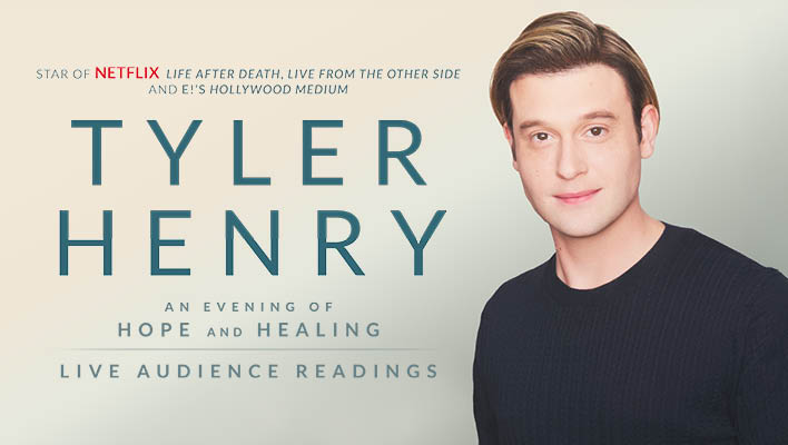 a promotional headshot of Tyler Henry in a black shirt