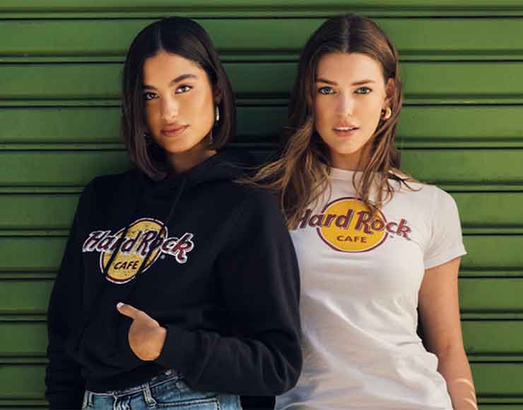 Two women wearing classic tee