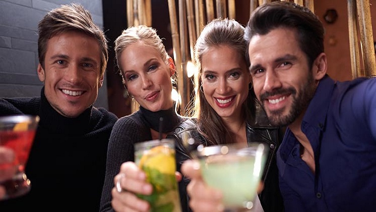 Two Couples Having a Good Time at L Bar