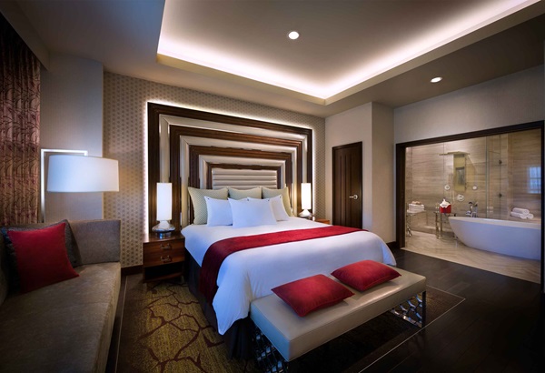 private bedroom with a king bed in West Tower Grand Suite at Seminole Hard Rock Hotel & Casino Tampa