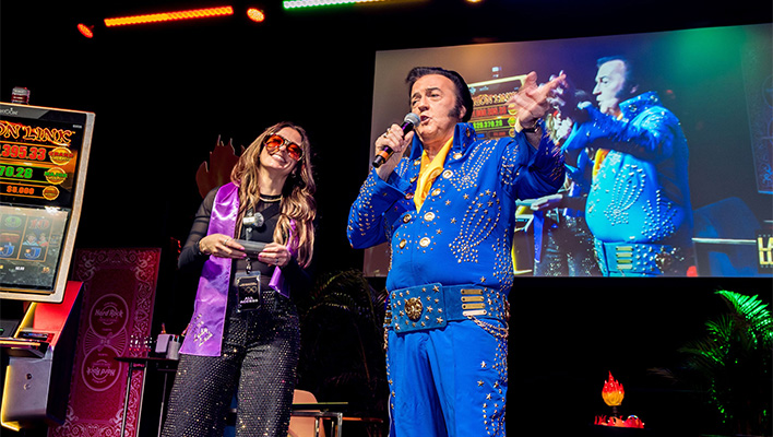 Lady Luck and Elvis Impersonator on a stage