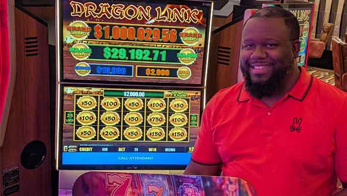 Jackpot winner of Ocala, Florida, celebrates winning $1,305,986 at Seminole Hard Rock Hotel & Casino Tampa.